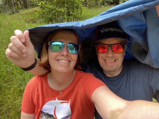 Katie & Jason sheltering from the rain