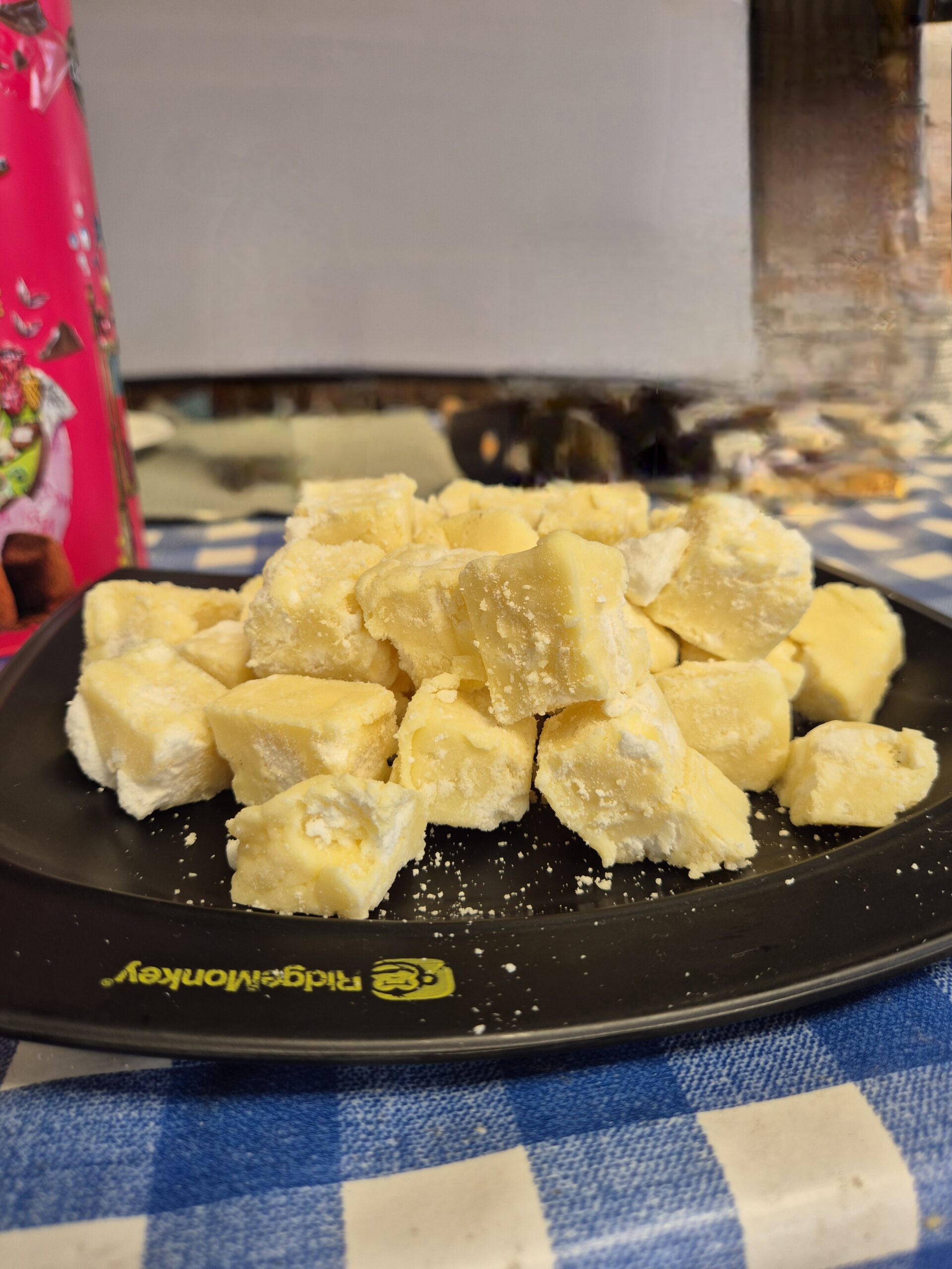 Lemon meringue fudge piled on a plate